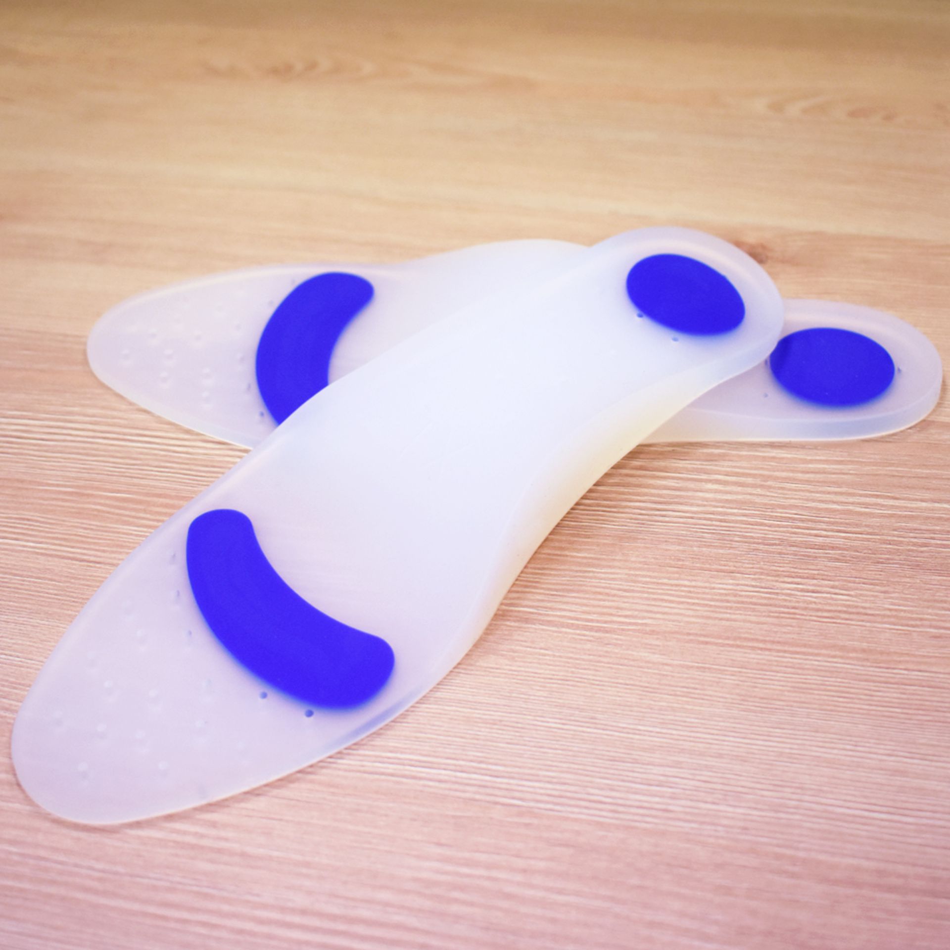 Palmilhas em Silicone com Elevação Metatársica Palmilhas em Silicone com Elevação Metatársica